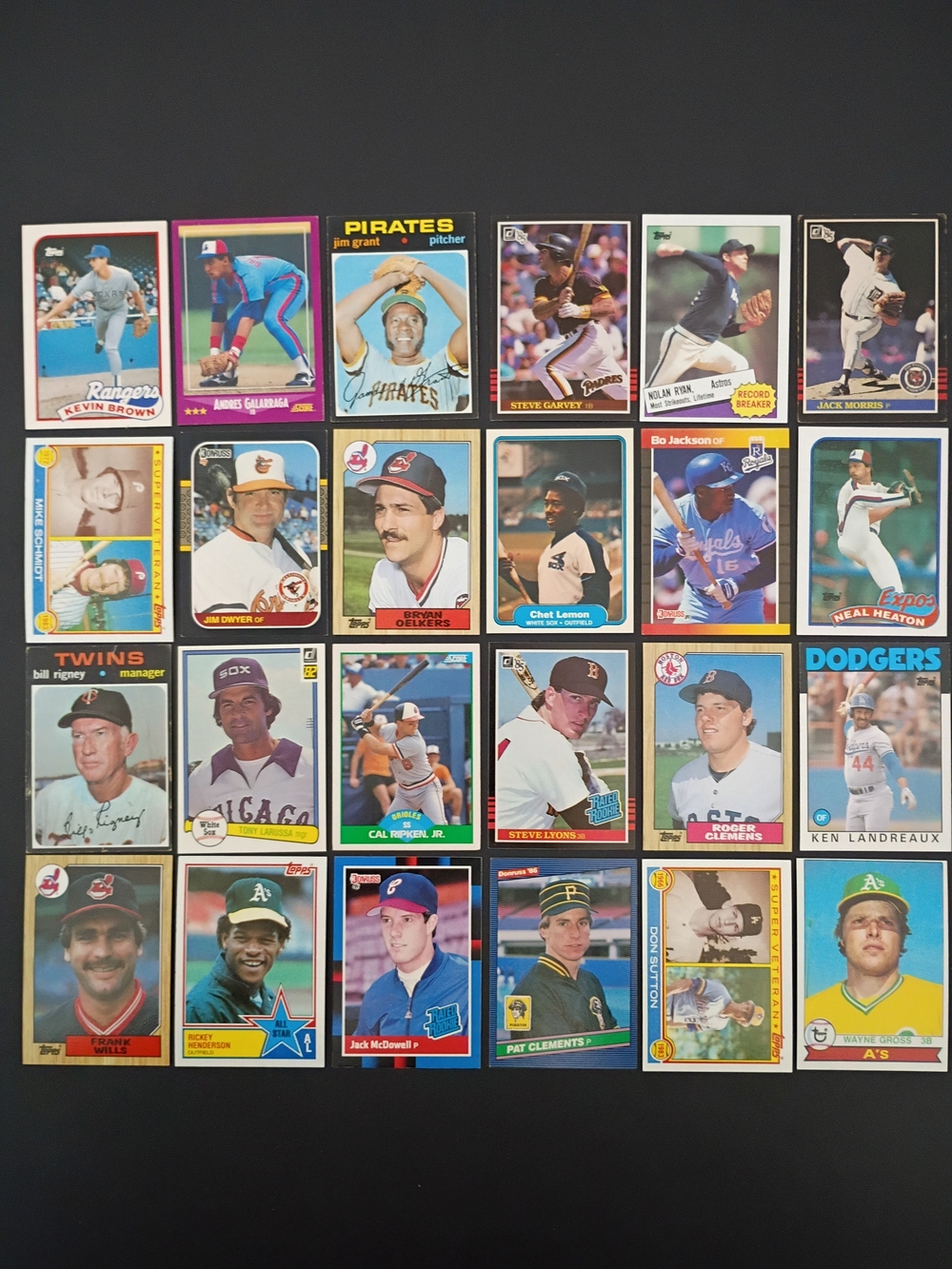 (24) baseball cards 1970s 1980s Rickey Henderson Mike Schmidt Nolan Ryan Ripken